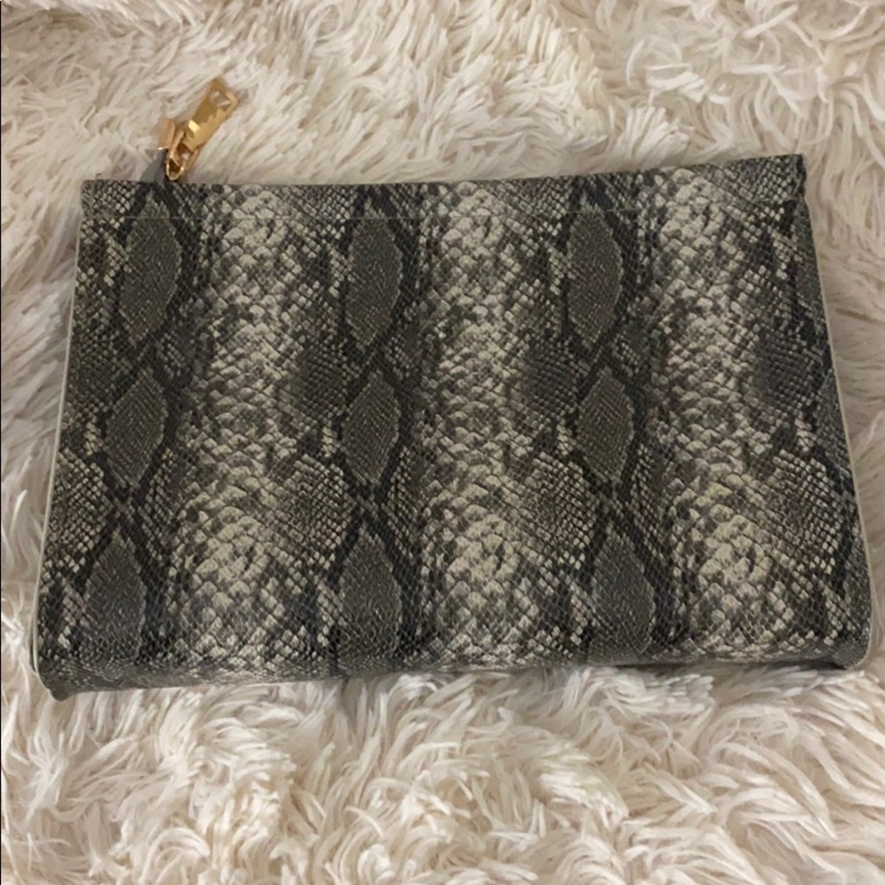 Snake print clutch
